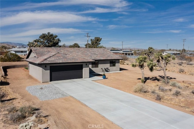 view of front of home featuring a garage