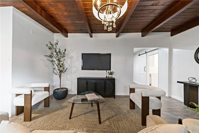 living room featuring beam ceiling, a barn door, hardwood / wood-style flooring, and wood ceiling