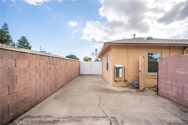 view of home's exterior with a patio