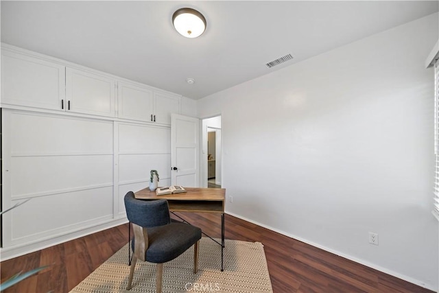 office with dark hardwood / wood-style floors