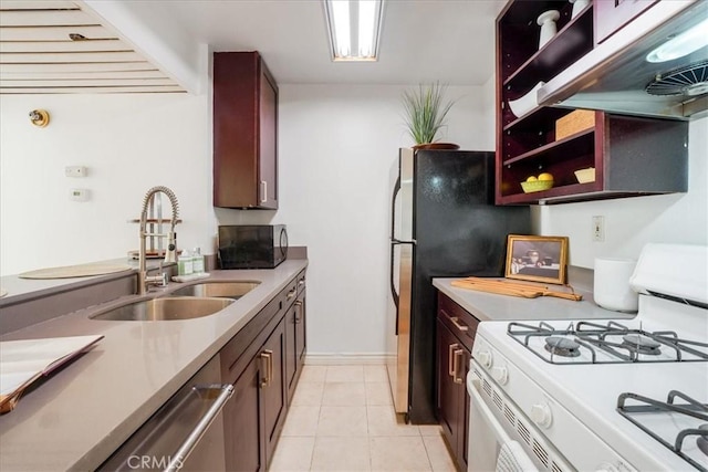 kitchen featuring sink, dishwasher, light tile patterned flooring, exhaust hood, and white gas stove