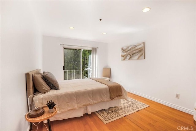 bedroom featuring wood-type flooring