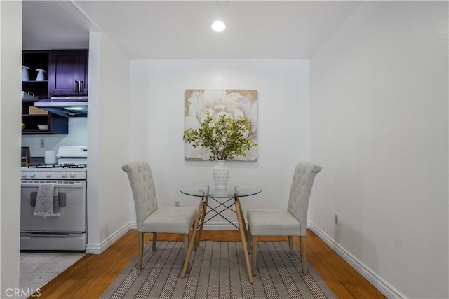 dining area featuring light wood-type flooring