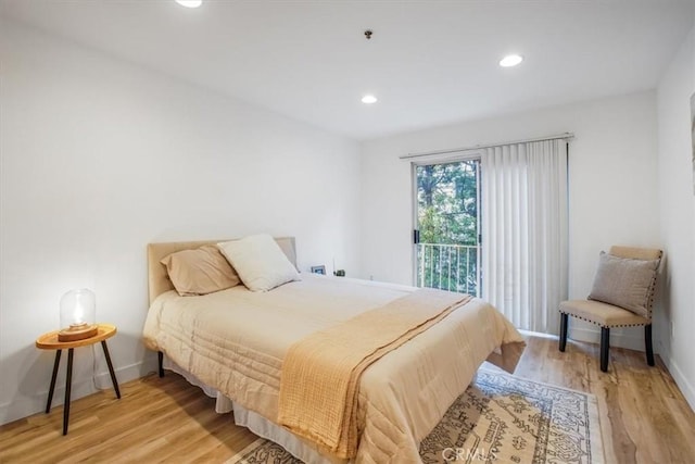 bedroom featuring light hardwood / wood-style floors