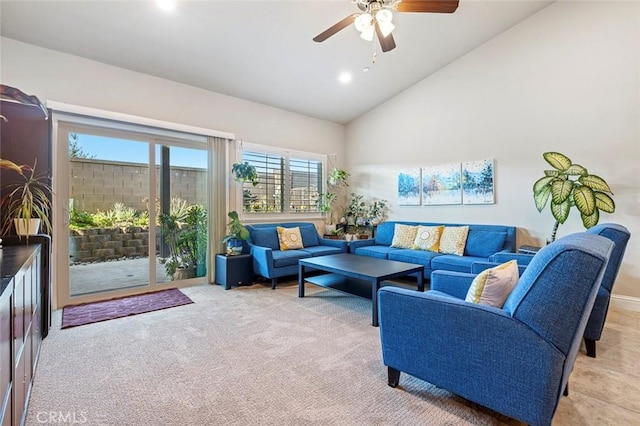 living room featuring high vaulted ceiling and ceiling fan