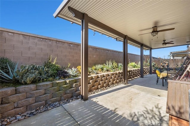 view of patio / terrace featuring ceiling fan