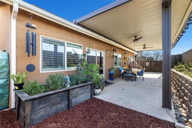 view of patio with ceiling fan