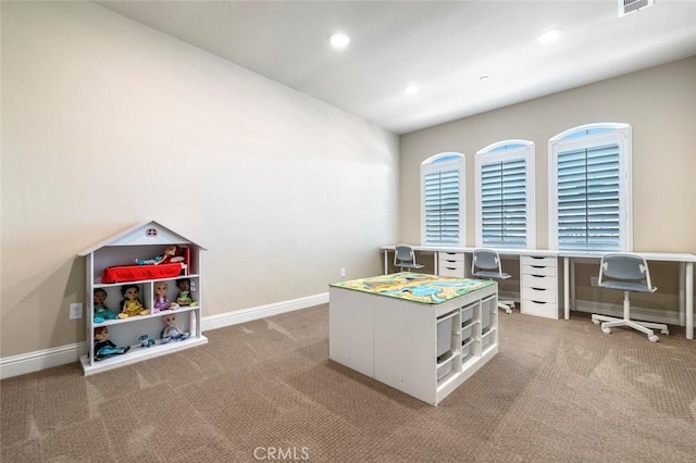 playroom featuring light colored carpet