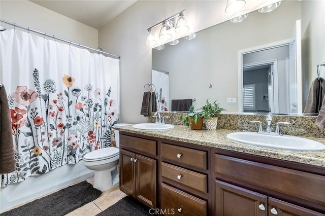 full bathroom featuring shower / tub combo with curtain, tile patterned floors, toilet, and vanity