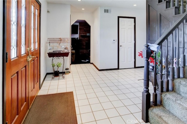 view of tiled foyer entrance