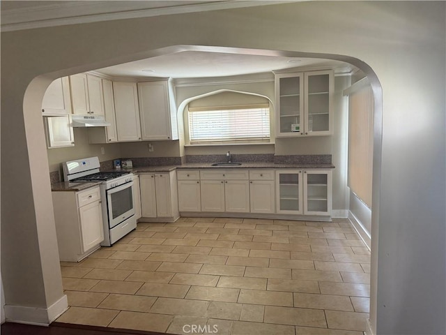 kitchen with white cabinetry, white range with gas cooktop, and sink