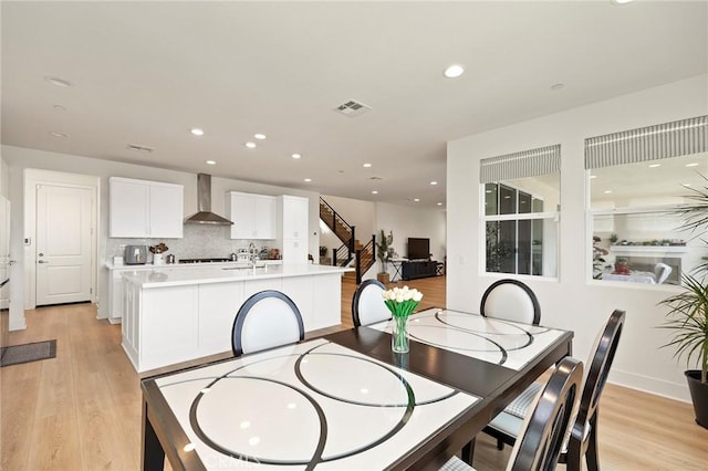 dining area featuring light hardwood / wood-style floors