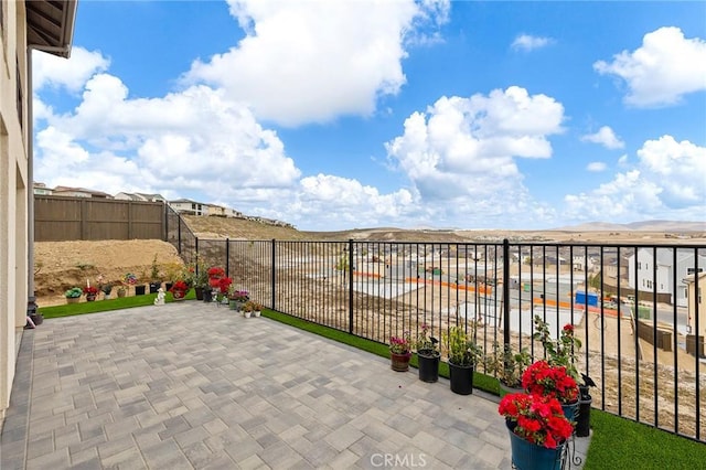 view of patio / terrace with a mountain view