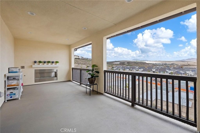 balcony featuring a mountain view