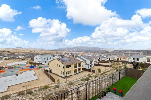 birds eye view of property featuring a mountain view