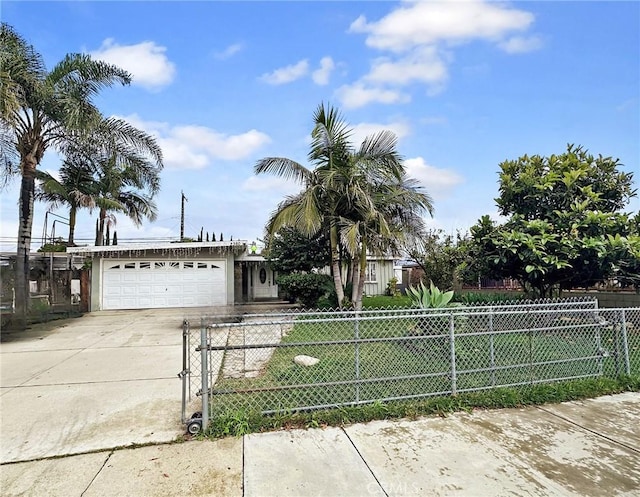 view of front of home with a garage and a front yard