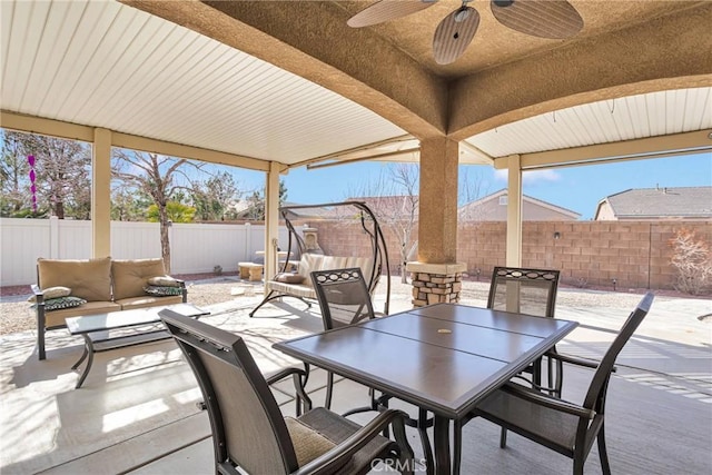 view of patio featuring an outdoor living space and ceiling fan