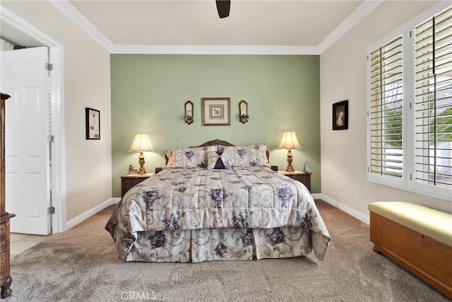 bedroom with ornamental molding, ceiling fan, and carpet