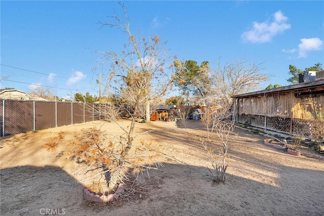 view of yard featuring fence