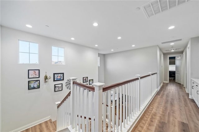 corridor featuring light hardwood / wood-style flooring