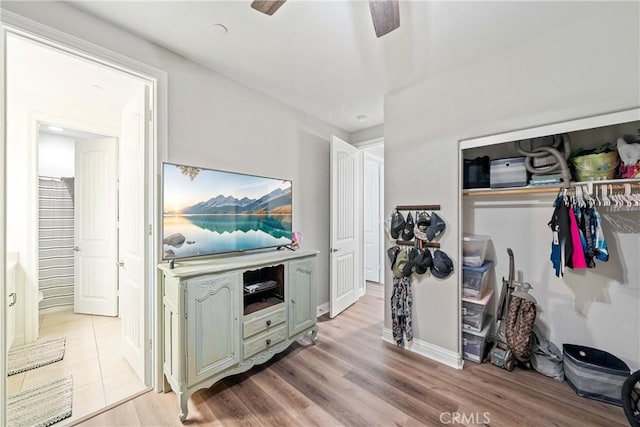 kitchen featuring light hardwood / wood-style flooring and ceiling fan