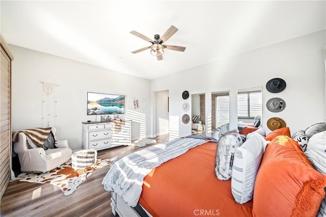 bedroom featuring ceiling fan and wood-type flooring