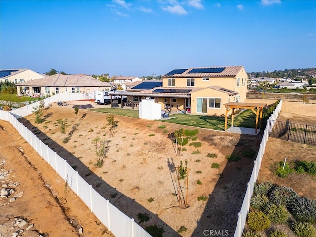 exterior space featuring solar panels