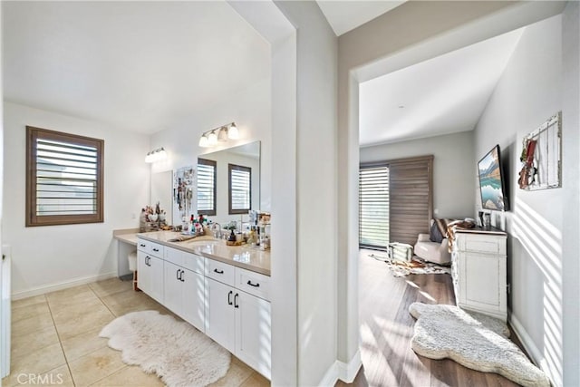 bathroom with vanity and tile patterned floors