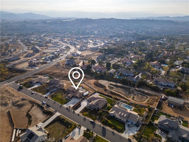 drone / aerial view featuring a mountain view