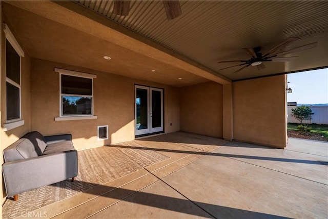 view of patio / terrace featuring french doors and ceiling fan