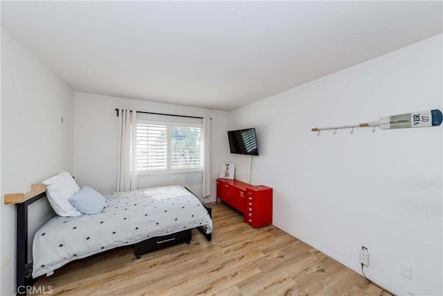 bedroom featuring light hardwood / wood-style floors