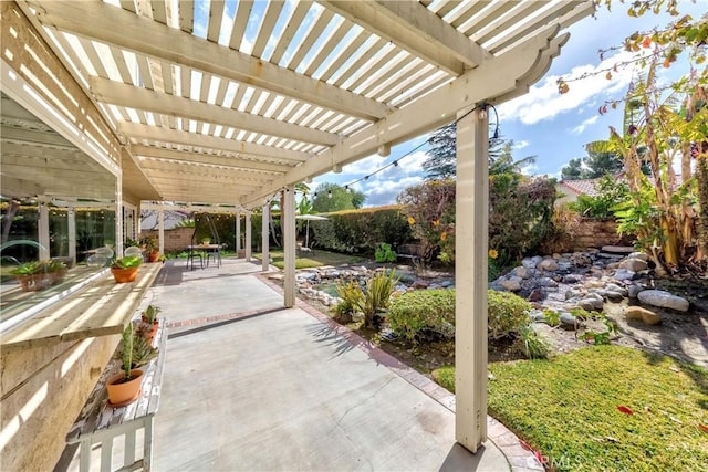 view of patio featuring a pergola