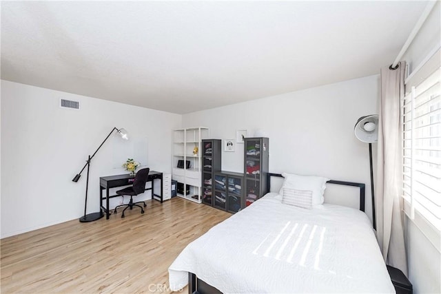 bedroom featuring light hardwood / wood-style floors