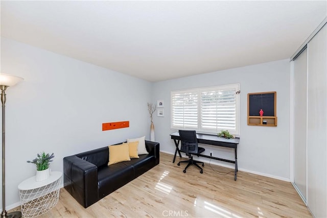 home office featuring light hardwood / wood-style floors