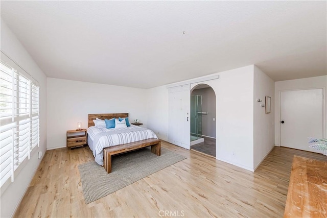 bedroom featuring light hardwood / wood-style floors