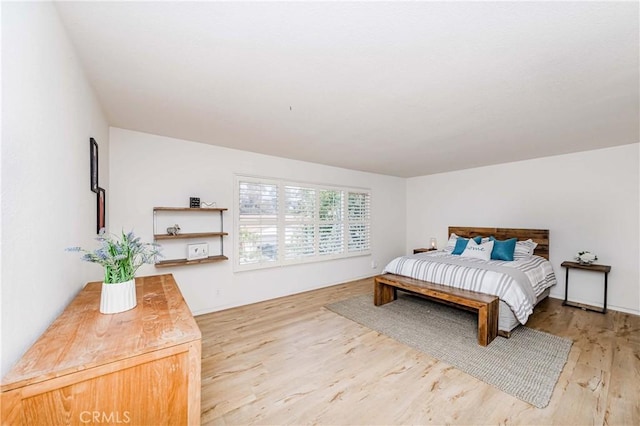 bedroom with light wood-type flooring