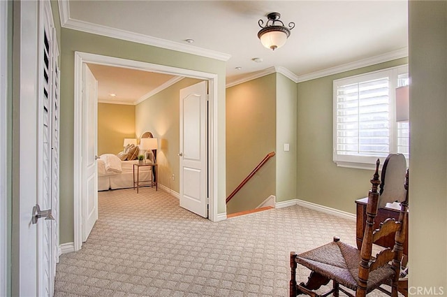 hall featuring crown molding and light colored carpet