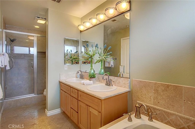 bathroom with vanity, a shower with shower door, and toilet