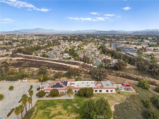 drone / aerial view featuring a mountain view