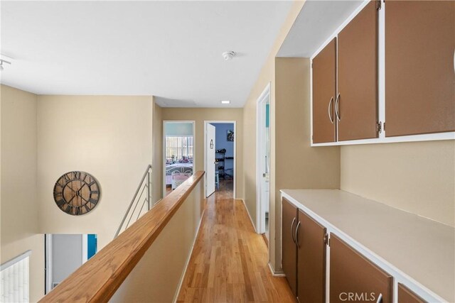 corridor featuring light hardwood / wood-style flooring