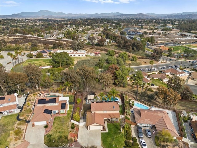 bird's eye view with a mountain view