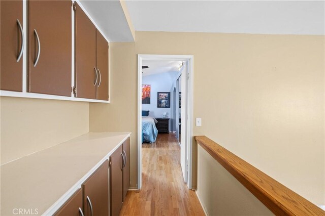 hallway with light wood-type flooring