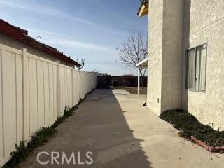 view of property exterior featuring a patio