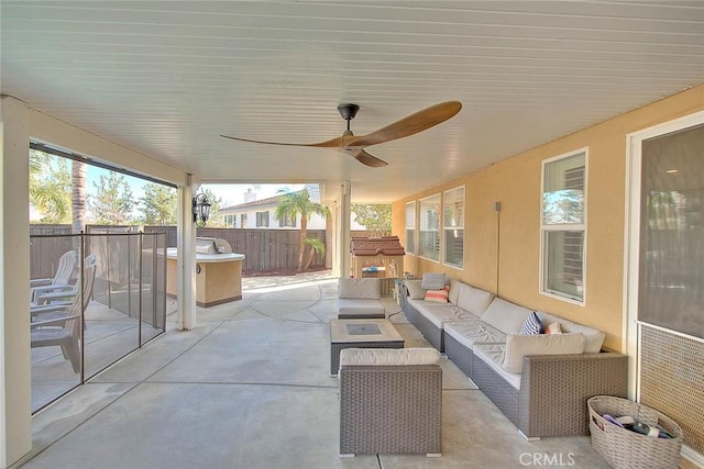 view of patio with an outdoor hangout area and ceiling fan