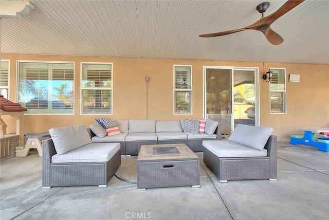 view of patio / terrace with an outdoor living space and ceiling fan