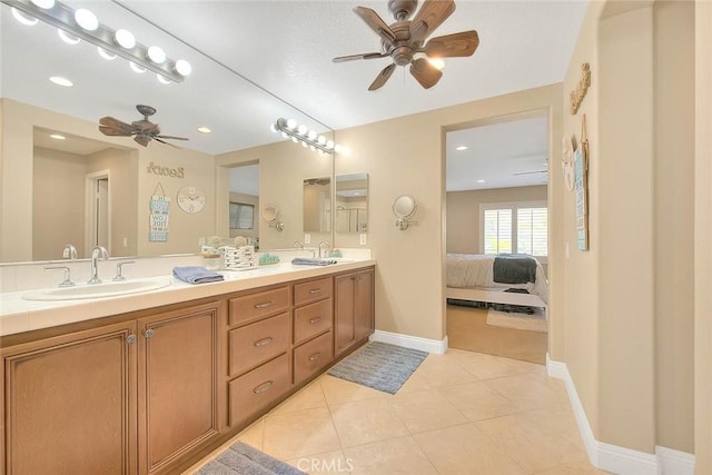 bathroom featuring vanity, tile patterned floors, and ceiling fan