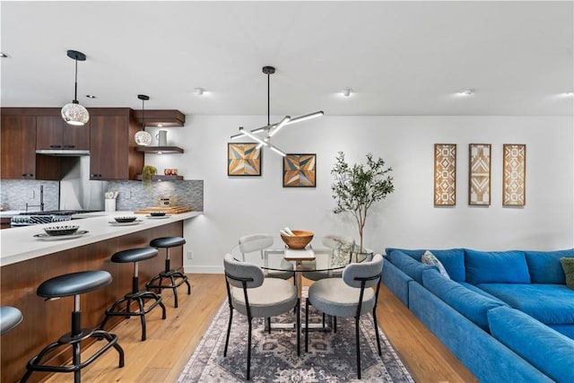 dining area with light wood-type flooring