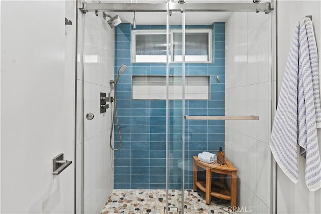 bathroom featuring walk in shower