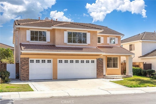 mediterranean / spanish-style house featuring a garage