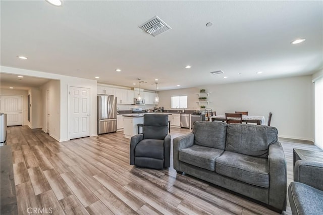 living room featuring light hardwood / wood-style flooring